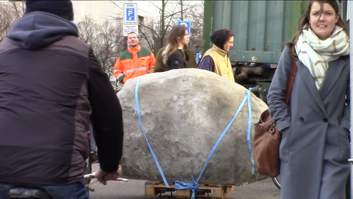 screenshot of video documentation of the tranportation of the rock